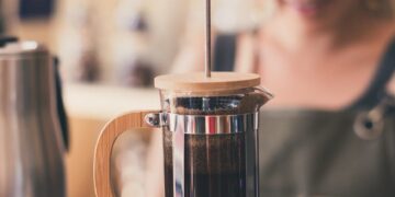 photo of french press on top on weighing scale